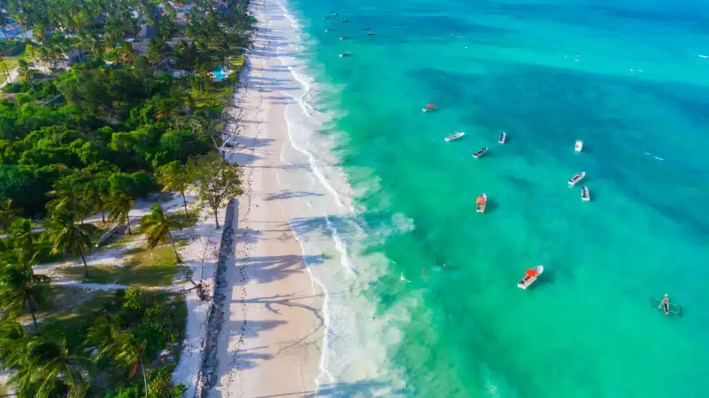 A breathtaking view of paje beach, zanzibar, showcasing the idyllic tanzania beaches with golden sands and crystal-clear waters.