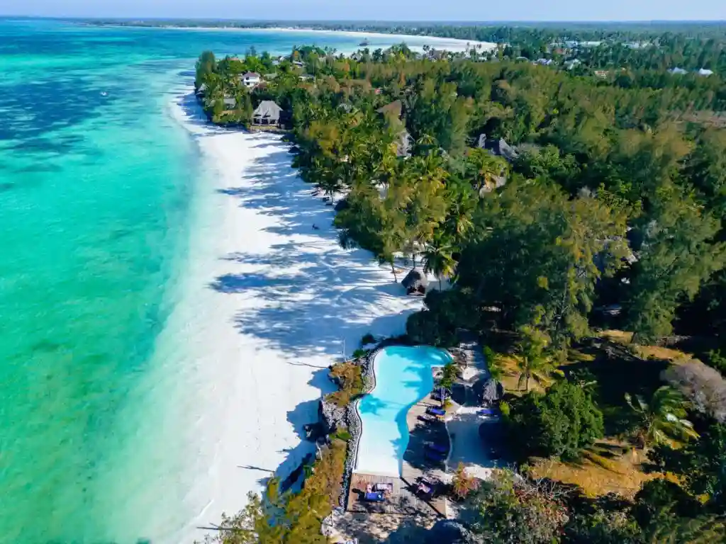 A scenic view of pongwe beach in zanzibar, representing the allure of tanzania beaches with turquoise waters and sandy shores.