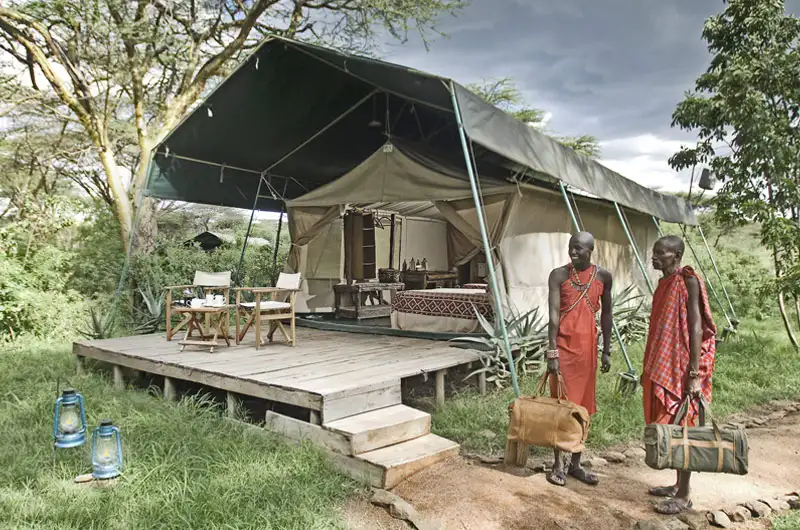 Experience the essence of maasai mara accommodation with a view of porini mara tented camp's serene surroundings.